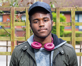 Young man with pink headphone Young man with pink headphones