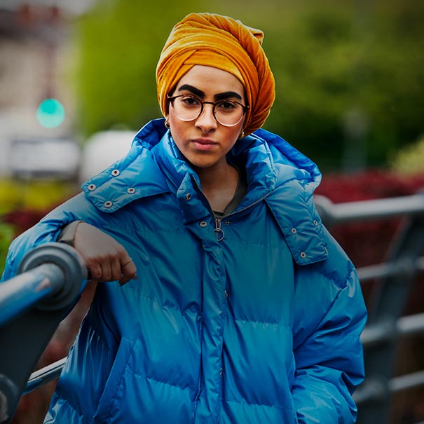 Young woman on a bridge